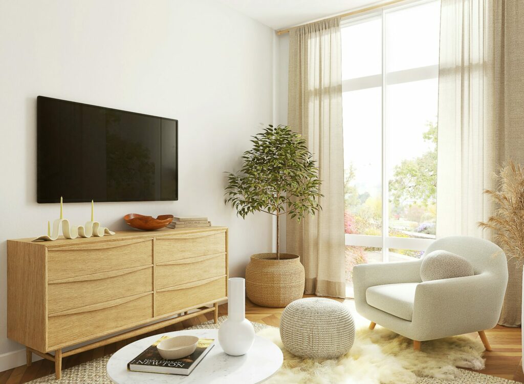 Brightly lit living room with long curtains.